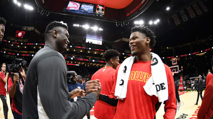 ATLANTA, GA – OCTOBER 7: Zion Williamson #1 of the New Orleans Pelicans talks with Cameron Reddish #22 of the Atlanta Hawks after a pre-season game on October 7, 2019 at State Farm Arena in Atlanta, Georgia. NOTE TO USER: User expressly acknowledges and agrees that, by downloading and/or using this Photograph, user is consenting to the terms and conditions of the Getty Images License Agreement. Mandatory Copyright Notice: Copyright 2019 NBAE (Photo by Scott Cunningham/NBAE via Getty Images)