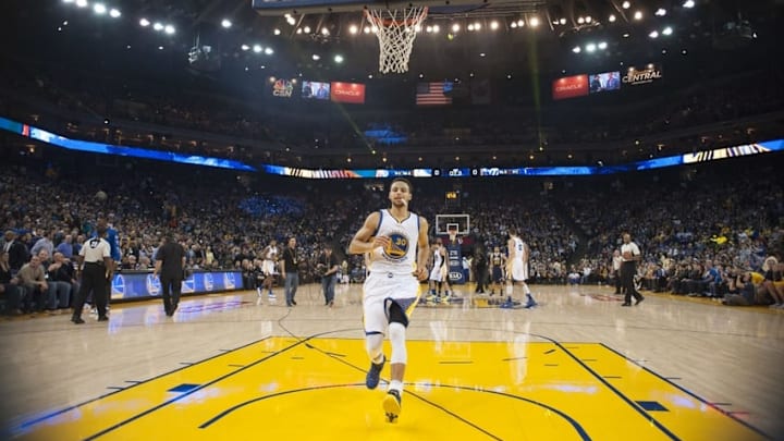 Mar 9, 2016; Oakland, CA, USA; Golden State Warriors guard Stephen Curry (30) celebrates after a three point basket against the Utah Jazz during the second quarter at Oracle Arena. Mandatory Credit: Kelley L Cox-USA TODAY Sports
