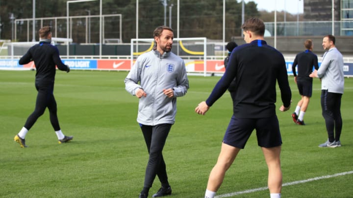 BURTON-UPON-TRENT, ENGLAND - MARCH 23: England Manager Gareth Southgate speaks to James Tarkowski during a training session ahead of their European Championship Qualification match against Montenegro at St Georges Park on March 23, 2019 in Burton-upon-Trent, England. (Photo by Marc Atkins/Getty Images)