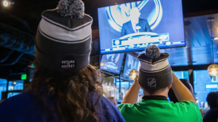 SEATTLE, WA - DECEMBER 04: Seattle NHL fans watch the announcement of Seattle being named the National Hockey League's 32nd franchise through expansion on December 4, 2018 at Henry's Tavern in downtown Seattle, WA. (Photo by Christopher Mast/Icon Sportswire via Getty Images)