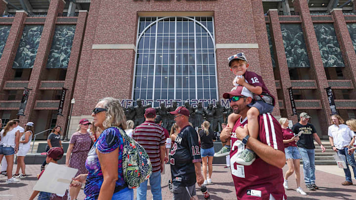 Sep 16, 2023; College Station, Texas, USA; Fans walk in front of Kyle Field before the game between the Texas A&M Aggies and the UL Monroe Warhawks. Mandatory Credit: Troy Taormina-USA TODAY Sports