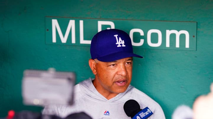 BOSTON, MASSACHUSETTS - JULY 12: Manager Dave Roberts #30 of the Los Angeles Dodgers gives an interview before the game against the Boston Red Sox at Fenway Park on July 12, 2019 in Boston, Massachusetts. (Photo by Omar Rawlings/Getty Images)