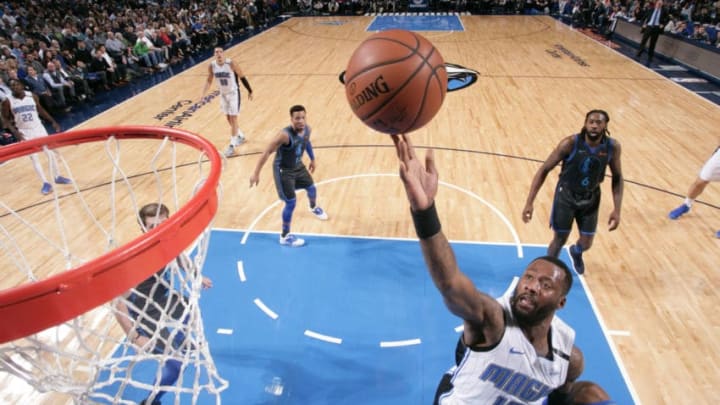 DALLAS, TX - DECEMBER 10: Jonathon Simmons #17 of the Orlando Magic drives to the basket during the game against the Dallas Mavericks on December 10, 2018 at the American Airlines Center in Dallas, Texas. NOTE TO USER: User expressly acknowledges and agrees that, by downloading and or using this photograph, User is consenting to the terms and conditions of the Getty Images License Agreement. Mandatory Copyright Notice: Copyright 2018 NBAE (Photo by Glenn James/NBAE via Getty Images)