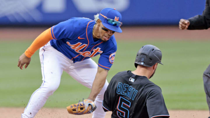 NEW YORK, NY - JUNE 18: Jon Berti #5 of the Miami Marlins steals second base during the game against the New York Mets at Citi Field on June 18, 2022 in New York City. (Photo by Christopher Pasatieri/Getty Images)