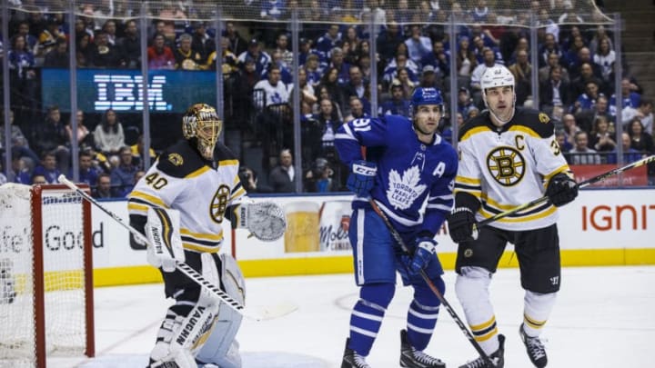 TORONTO, ON - JANUARY 12: John Tavares #91 of the Toronto Maple Leafs battles in front of the net against Zdeno Chara #33 of the Boston Bruins during the second period at the Scotiabank Arena on January 12, 2019 in Toronto, Ontario, Canada. (Photo by Kevin Sousa/NHLI via Getty Images)