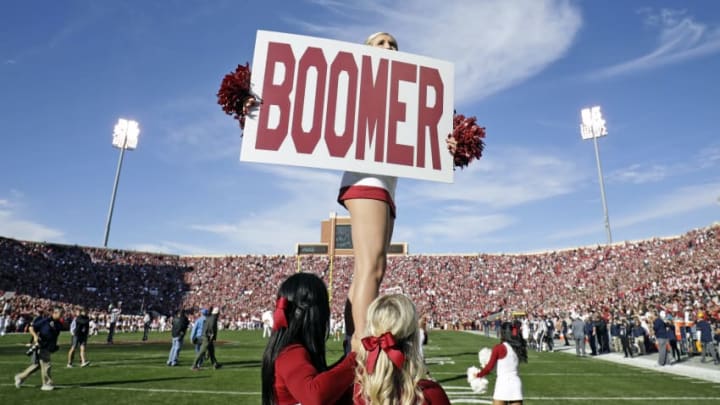 NORMAN, OK - NOVEMBER 25: Members of the Oklahoma Sooners spirit squad perform before the game against the West Virginia Mountaineers at Gaylord Family Oklahoma Memorial Stadium on November 25, 2017 in Norman, Oklahoma. Oklahoma defeated West Virginia 59-31. (Photo by Brett Deering/Getty Images) *** Local Caption ***