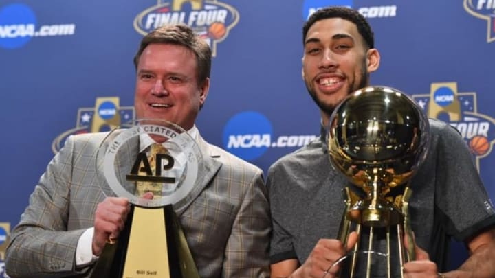 Mar 31, 2016; Houston, TX, USA; Michigan State Spartans guard Denzel Valentine and Kansas Jayhawks head coach Bill Self pose for a photo with their trophies during a press conference at NRG Stadium. Mandatory Credit: Bob Donnan-USA TODAY Sports