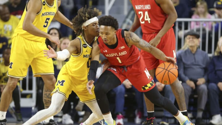 Jan 1, 2023; Ann Arbor, Michigan, USA; Maryland Terrapins guard Jahmir Young (1) handles the ball against Michigan Wolverines guard Dug McDaniel (0) during the first half at Crisler Center. Mandatory Credit: Brian Bradshaw Sevald-USA TODAY Sports