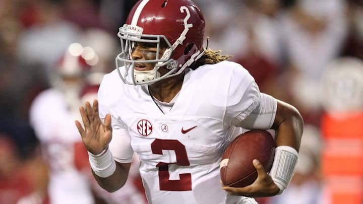 Oct 8, 2016; Fayetteville, AR, USA; Alabama Crimson Tide quarterback Jalen Hurts (2) rushes against the Arkansas Razorbacks during the second quarter at Donald W. Reynolds Razorback Stadium. Mandatory Credit: Nelson Chenault-USA TODAY Sports