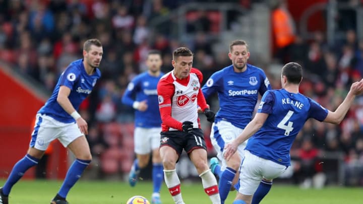 SOUTHAMPTON, ENGLAND – NOVEMBER 26: Dusan Tadic of Southampton is tackled by Michael Keane of Everton as Gylfi Sigurdsson of Everton looks on during the Premier League match between Southampton and Everton at St Mary’s Stadium on November 26, 2017 in Southampton, England. (Photo by Richard Heathcote/Getty Images)