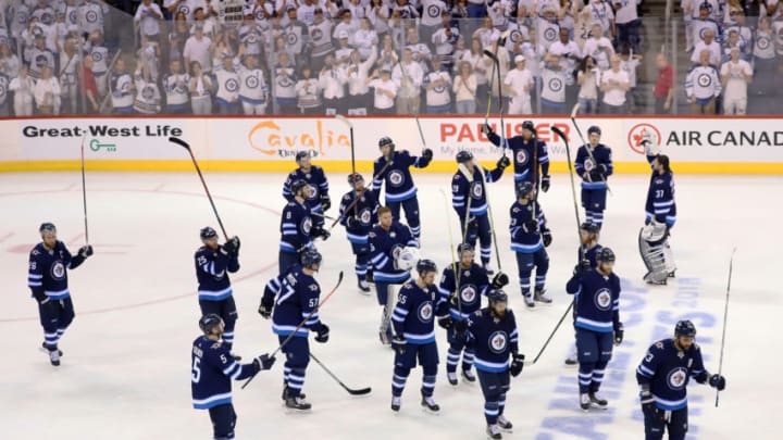 WINNIPEG, MB - MAY 20: Winnipeg Jets players salute the fans following a 2-1 loss to the Vegas Golden Knights in Game Five of the Western Conference Final during the 2018 NHL Stanley Cup Playoffs at the Bell MTS Place on May 20, 2018 in Winnipeg, Manitoba, Canada. (Photo by Darcy Finley/NHLI via Getty Images)