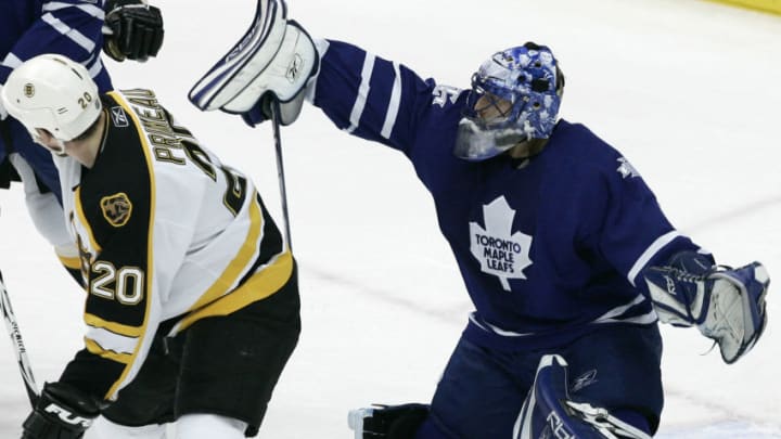 Toronto Maple Leafs goaltender Andrew Raycroft makes a blocker save as Boston's Wayne Primeau looks behind him for a rebound during game between the Toronto Maple Leafs and Boston Bruins at the Air Canada Centre in Toronto, Canada on November 28, 2006. (Photo by Jay Gula/Getty Images)