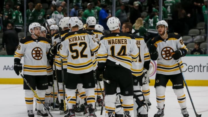 DALLAS, TX - OCTOBER 03: The Boston Bruins celebrate a victory after winning the game between the Dallas Stars and the Boston Bruins on October 03, 2019 at American Airlines Center in Dallas, Texas. (Photo by Matthew Pearce/Icon Sportswire via Getty Images)