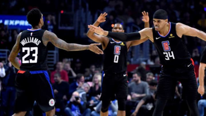 LOS ANGELES, CA – MARCH 9: Tobias Harris #34 and Lou Williams #23 of the LA Clippers high five during the game against the Cleveland Cavaliers on March 8, 2018 at STAPLES Center in Los Angeles, California. NOTE TO USER: User expressly acknowledges and agrees that, by downloading and/or using this Photograph, user is consenting to the terms and conditions of the Getty Images License Agreement. Mandatory Copyright Notice: Copyright 2018 NBAE (Photo by Adam Pantozzi/NBAE via Getty Images)