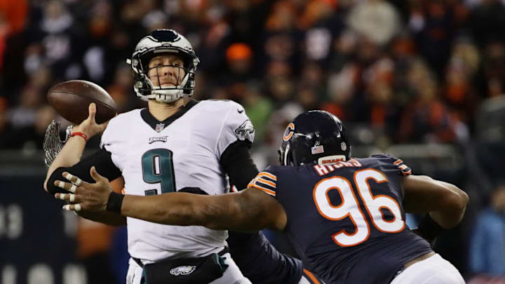 CHICAGO, ILLINOIS - JANUARY 06: Nick Foles #9 of the Philadelphia Eagles looks to pass under pressure from Akiem Hicks #96 of the Chicago Bears in the second quarter of the NFC Wild Card Playoff game at Soldier Field on January 06, 2019 in Chicago, Illinois. (Photo by Jonathan Daniel/Getty Images)