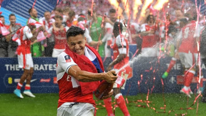 LONDON, ENGLAND - MAY 27: Alexis Sanchez of Arsenal celebrates victory after the Emirates FA Cup Final between Arsenal and Chelsea at Wembley Stadium on May 27, 2017 in London, England. (Photo by Laurence Griffiths/Getty Images)