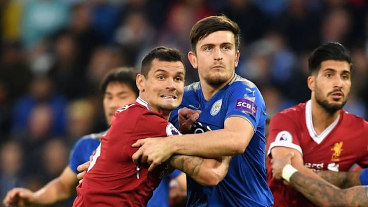 LEICESTER, ENGLAND - SEPTEMBER 23: Dejan Lovren of Liverpool and Harry Maguire of Leicester City in action during the Premier League match between Leicester City and Liverpool at The King Power Stadium on September 23, 2017 in Leicester, England. (Photo by Laurence Griffiths/Getty Images)