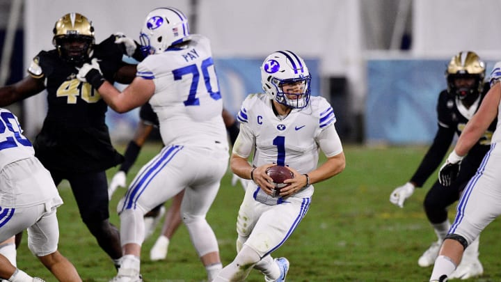 BOCA RATON, FLORIDA – DECEMBER 22: Zach Wilson #1 of the Brigham Young Cougars looks to pass against the Central Florida Knights at FAU Stadium on December 22, 2020 in Boca Raton, Florida. (Photo by Mark Brown/Getty Images)