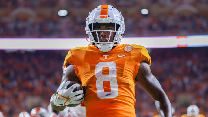 Sep 2, 2021; Knoxville, Tennessee, USA; Tennessee Volunteers running back Tiyon Evans (8) runs for a touchdown against the Bowling Green Falcons during the second half at Neyland Stadium. Mandatory Credit: Randy Sartin-USA TODAY Sports