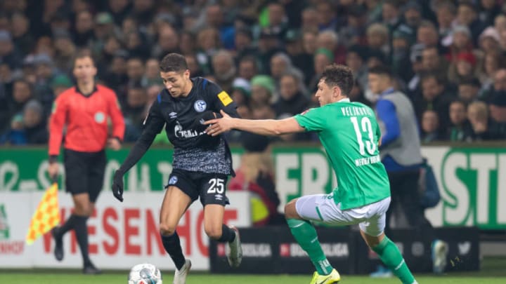 BREMEN, GERMANY - NOVEMBER 23: Milos Veljkovic of SV Werder Bremen and Amine Harit of FC Schalke 04battle for the ball during the Bundesliga match between SV Werder Bremen and FC Schalke 04 at Wohninvest Weserstadion on November 23, 2019 in Bremen, Germany. (Photo by TF-Images/Getty Images)