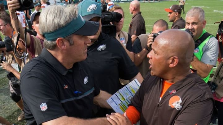 Sep 11, 2016; Philadelphia, PA, USA; Philadelphia Eagles head coach Doug Pederson (L) greets Cleveland Browns head coach Hue Jackson (R) on the field after the game at Lincoln Financial Field. The Philadelphia Eagles won 29-10. Mandatory Credit: Bill Streicher-USA TODAY Sports