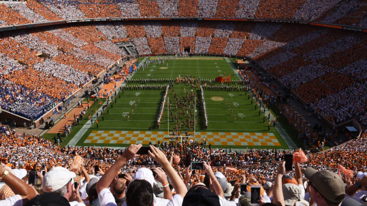 Tennessee players take the field as the University of Tennessee Pride of the Southland marching band performs a pregame show and fans checker Neyland Stadium orange and white for the Florida game on Saturday, Sept. 24, 2016.0925 Kcsp Utfl 012 Mp