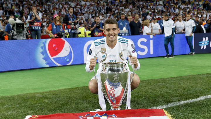 KIEV, UKRAINE – MAY 26: Mateo Kovacic of Real Madrid celebrates with The UEFA Champions League trophy following his sides victory in the UEFA Champions League Final between Real Madrid and Liverpool at NSC Olimpiyskiy Stadium on May 26, 2018 in Kiev, Ukraine. (Photo by Angel Martinez/Real Madrid via Getty Images)