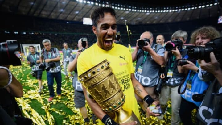 BERLIN, GERMANY – MAY 27: Pierre-Emerick Aubameyang of Dortmund celebrates with the trophy after winning the DFB Cup Final 2017 between Eintracht Frankfurt and Borussia Dortmund at Olympiastadion on May 27, 2017 in Berlin, Germany. (Photo by Matthias Hangst/Bongarts/Getty Images)