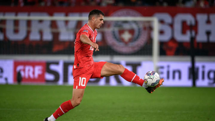 Switzerland’s midfielder Granit Xhaka controls the ball during the UEFA Nations League League A group 2 football match between Switzerland and the Czech Republic at Kybunpark stadium in St. Gallen on September 27, 2022. (Photo by Fabrice COFFRINI / AFP) (Photo by FABRICE COFFRINI/AFP via Getty Images)