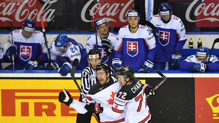 Canada's forward Mark Stone (C) and Canada's defender Thomas Chabot celebrate Canada's winning goal during the IIHF Men's Ice Hockey World Championships Group A match between Slovakia and Canada on May 13, 2019 in Kosice, Slovakia. (Photo by JOE KLAMAR / AFP) (Photo credit should read JOE KLAMAR/AFP/Getty Images)