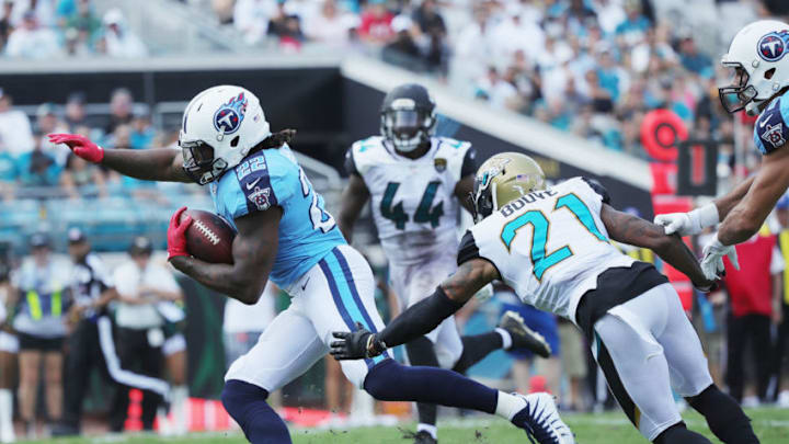 JACKSONVILLE, FL - SEPTEMBER 17: Derrick Henry No. 22 of the Tennessee Titans rushes for a 17-yard touchdown in the second half of their game against the Jacksonville Jaguars at EverBank Field on September 17, 2017 in Jacksonville, Florida. (Photo by Logan Bowles/Getty Images)