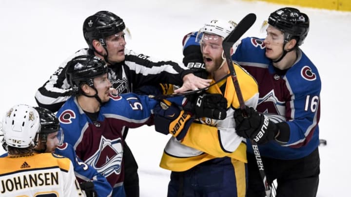 DENVER, CO - APRIL 22: Nikita Zadorov (16) of the Colorado Avalanche grabs Ryan Ellis (4) of the Nashville Predators as he jaws with Duncan Siemens (15) during the second period on Sunday, April 22, 2018. The Colorado Avalanche hosted the Nashville Predators. (Photo by AAron Ontiveroz/The Denver Post via Getty Images)