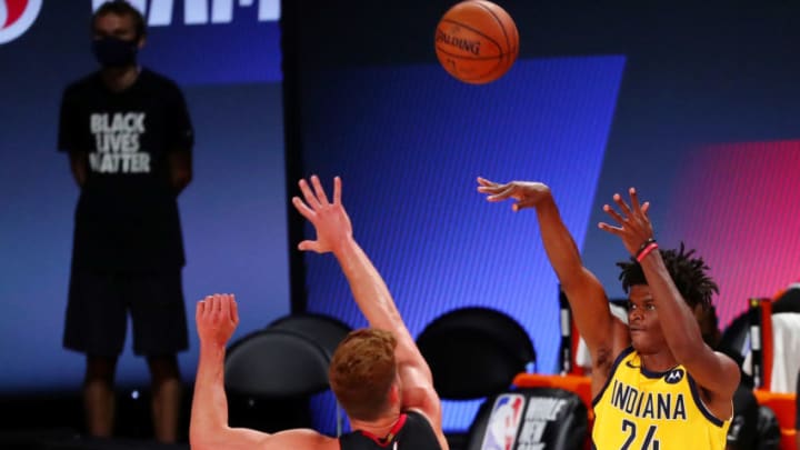 Indiana Pacers forward Alize Johnson (24) shoots over Miami Heat center Meyers Leonard (0)(Kim Klement-USA TODAY Sports)
