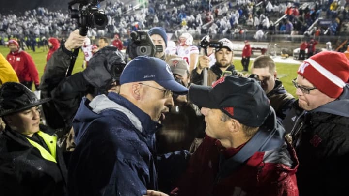 UNIVERSITY PARK, PA - NOVEMBER 18: Head coach James Franklin of the Penn State Nittany Lions shakes hands with head coach Mike Riley of the Nebraska Cornhuskers after the game on November 18, 2017 at Beaver Stadium in University Park, Pennsylvania. Penn State defeats Nebraska 56-44. (Photo by Brett Carlsen/Getty Images)