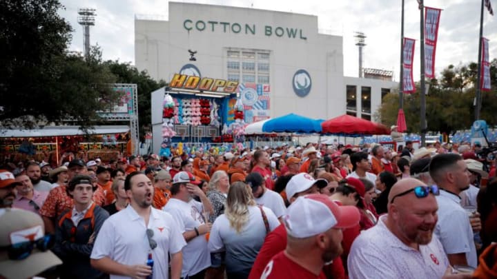 Fans pack the area around ESPN's College GameDay before the Red River Rivalry college football game between the University of Oklahoma Sooners (OU) and the University of Texas (UT) Longhorns at the Cotton Bowl in Dallas, Saturday, Oct. 7, 2023.