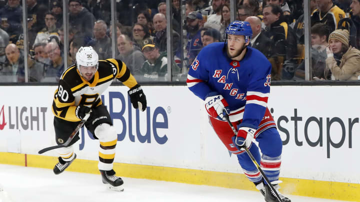 BOSTON, MA – MARCH 27: Boston Bruins left wing Marcus Johansson (90) chases New York Rangers defenseman Fredrik Claesson (33) during a game between the Boston Bruins and the New York Rangers on March 27, 2019, at TD Garden in Boston, Massachusetts. (Photo by Fred Kfoury III/Icon Sportswire via Getty Images)