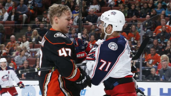 ANAHEIM, CA - NOVEMBER 4: Hampus Lindholm #47 of the Anaheim Ducks and Nick Foligno #71 of the Columbus Blue Jackets tangle up during the second period of the game at Honda Center on November 4, 2018 in Anaheim, California. (Photo by Debora Robinson/NHLI via Getty Images)