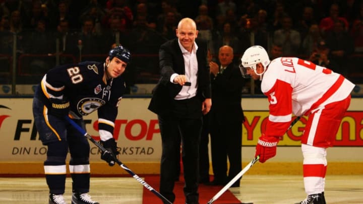 STOCKHOLM, SWEDEN - OCTOBER 03: #5 Nicklas Lidstrom of Detroit Red Wings and #20 Alexander Steen of St. Louis Blues have a ceremonial face-off with recently retired player Mats Sundin (C) prior to the start of the 2009 Compuware NHL Premiere Stockholm match between St. Louis Blues and Detroit Red Wings at the Ericsson Globe on October 3, 2009 in Stockholm, Sweden. (Photo by Paul Gilham/Getty Images)