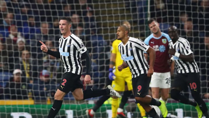 BURNLEY, ENGLAND - NOVEMBER 26: Ciaran Clark of Newcastle United (2) celebrates after scoring his team's second goal with Salomon Rondon (9) during the Premier League match between Burnley FC and Newcastle United at Turf Moor on November 26, 2018 in Burnley, United Kingdom. (Photo by Clive Brunskill/Getty Images)