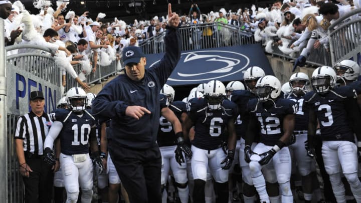 STATE COLLEGE, PA - OCTOBER 27: Head coach Bill O'Brien of the Penn State Nittany Lions leads his team onto the field before playing the Ohio State Buckeyes at Beaver Stadium on October 27, 2012 in State College, Pennsylvania. (Photo by Patrick Smith/Getty Images)
