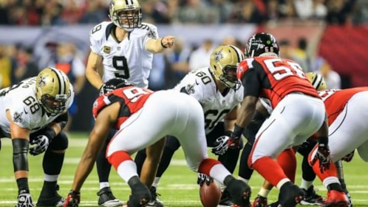 Nov 21, 2013; Atlanta, GA, USA; New Orleans Saints quarterback Drew Brees (9) calls a block in the second half against the Atlanta Falcons at the Georgia Dome. The Saints won 17-13. Mandatory Credit: Daniel Shirey-USA TODAY Sports