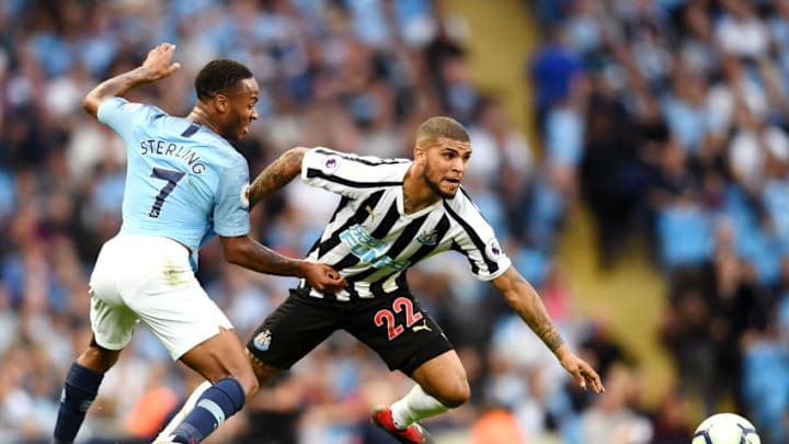 MANCHESTER, ENGLAND - SEPTEMBER 01: Deandre Yedlin of Newcastle United is challenged by Raheem Sterling of Manchester City during the Premier League match between Manchester City and Newcastle United at Etihad Stadium on September 1, 2018 in Manchester, United Kingdom. (Photo by Clive Mason/Getty Images)