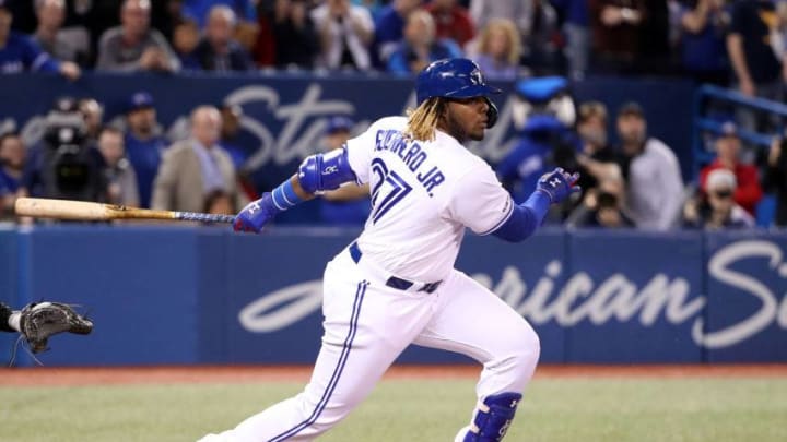 Vladimir Guerrero Jr. #27 of the Toronto Blue Jays grounds out in his first Major League at-bat in the second inning during MLB game action against the Oakland Athletics at Rogers Centre. (Photo by Tom Szczerbowski/Getty Images)