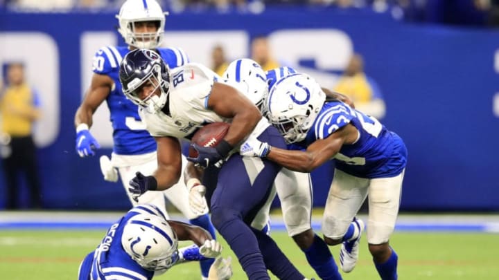 INDIANAPOLIS, INDIANA - NOVEMBER 18: Jonnu Smith #81 of the Tennessee Titans is tackled after a catch by the Indianapolis Colts in the second quarter at Lucas Oil Stadium on November 18, 2018 in Indianapolis, Indiana. (Photo by Andy Lyons/Getty Images)