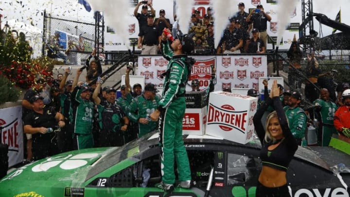 DOVER, DELAWARE - OCTOBER 06: Kyle Larson, driver of the #42 Clover Chevrolet, celebrates in Victory Lane after winning the Monster Energy NASCAR Cup Series Drydene 400 at Dover International Speedway on October 06, 2019 in Dover, Delaware. (Photo by Jeff Zelevansky/Getty Images)