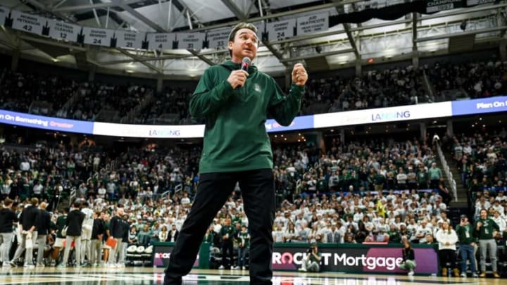 Michigan State's new football coach Jonathan Smith speaks to the crowd during a timeout in the basketball game against Georgia Southern on Tuesday, Nov. 28, 2023, at the Breslin Center in East Lansing.