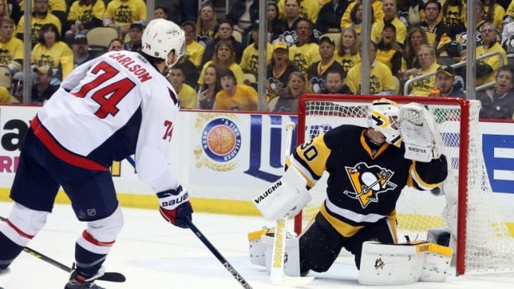 May 4, 2016; Pittsburgh, PA, USA; Washington Capitals defenseman John Carlson (74) scores a goal against Pittsburgh Penguins goalie Matt Murray (30) during the second period in game four of the second round of the 2016 Stanley Cup Playoffs at the CONSOL Energy Center. Mandatory Credit: Charles LeClaire-USA TODAY Sports