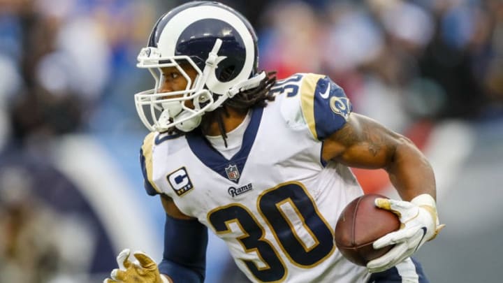 NASHVILLE, TN - DECEMBER 24: Running Back Todd Gurley II #30 of the Los Angeles Rams carries the ball against the Tennessee Titians at Nissan Stadium on December 24, 2017 in Nashville, Tennessee. (Photo by Wesley Hitt/Getty Images)