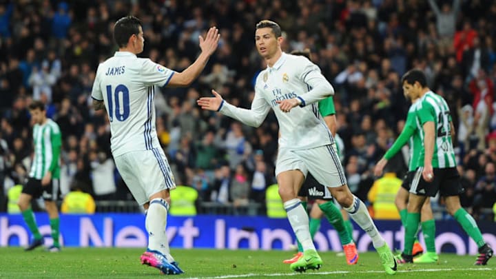 MADRID, SPAIN - MARCH 12: Cristiano Ronaldo of Real Madrid celebrates with James Rodriguez after scoring Real's opening goal during the La Liga match between Real Madrid CF and Real Betis Balompie at Estadio Santiago Bernabeu on March 12, 2017 in Madrid, Spain. (Photo by Denis Doyle/Getty Images)