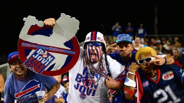 Aug 3, 2014; Canton, OH, USA; NFL fans holding a sign boycotting Bon Jovi from buying the Buffalo Bills during the third quarter of the 2014 Pro Football Hall of Fame game at Fawcett Stadium. Mandatory Credit: Andrew Weber-USA TODAY Sports Aug 3, 2014; Canton, OH, USA; NFL fans holding a sign boycotting Bon Jovi from buying the Buffalo Bills during the third quarter of the 2014 Pro Football Hall of Fame game at Fawcett Stadium. Mandatory Credit: Andrew Weber-USA TODAY Sports